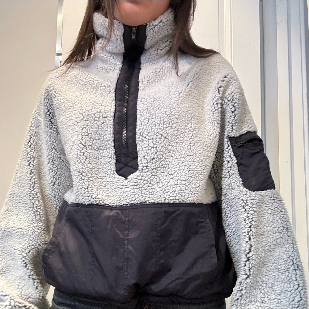 Large Free People fleece pullover jacket.